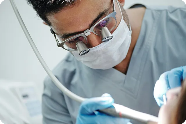 Dentist performing a dental procedure